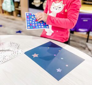 Constellation Activities child with stickers