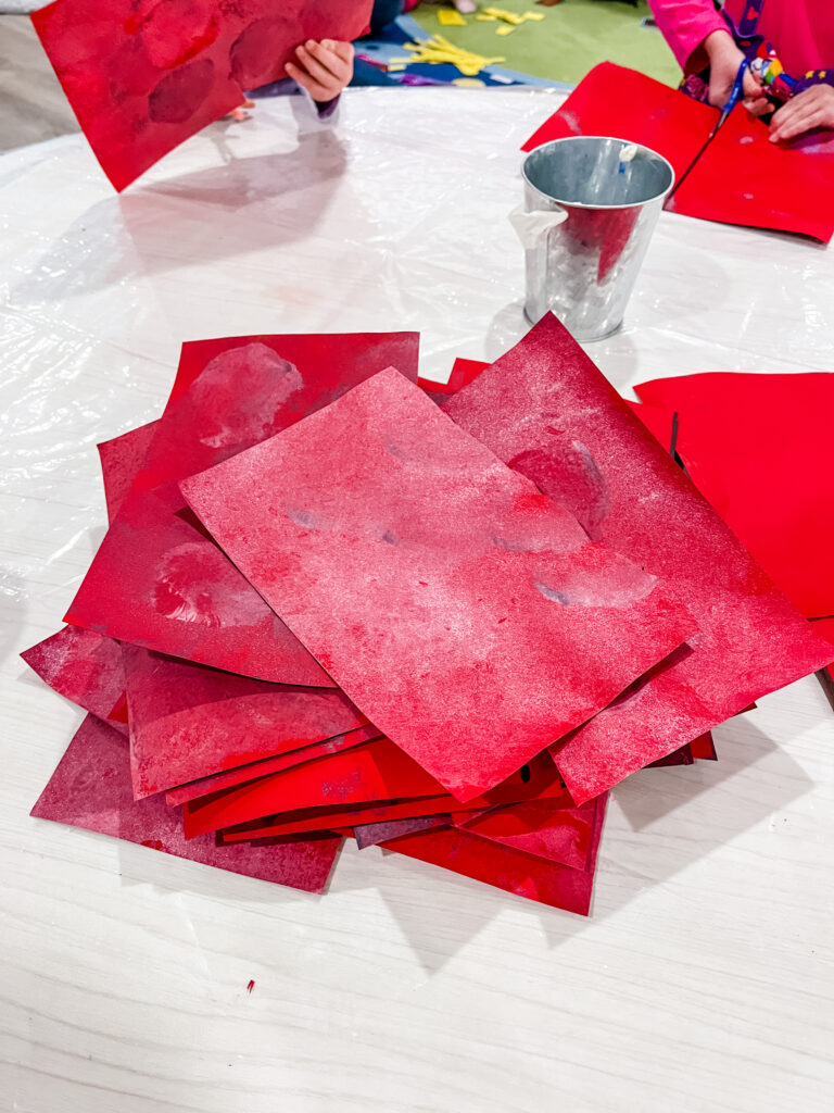 stack of red brick paper pieces