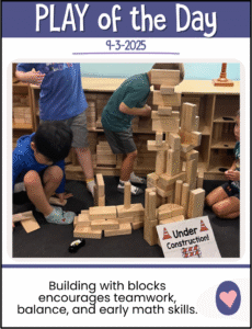 Children building a tall wooden block structure during preschool center time to practice teamwork, balance, and problem-solving.